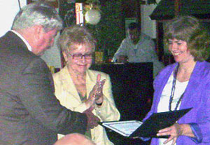 SOV presents certificate to De. Sheila Hixson (center)